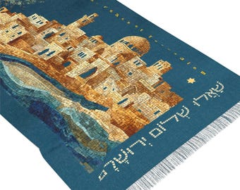 May include: A rectangular blue tapestry featuring a mosaic-style illustration of Jerusalem buildings in shades of tan and brown. The text reads "Pray for the peace of Jerusalem" and includes Hebrew script along the side with a small yellow star.