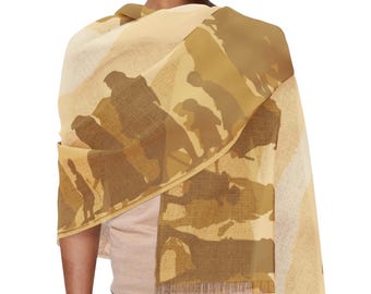 May include: A beige and brown patterned scarf with a silhouette design of people walking. The scarf has a fringed edge.