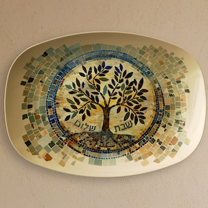 May include: A decorative ceramic platter with a mosaic design featuring a stylised tree with the Hebrew words "Shalom" and "Shabbat" at the base.