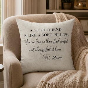 May include: A square off-white throw pillow featuring a subtle light gray floral pattern and black text that reads: A GOOD FRIEND IS LIKE A SOFT PILLOW- You can lean on them. find comfort and always feel at home. The name Beth is printed below.