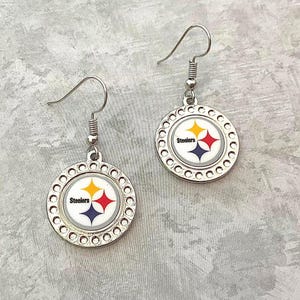 Pittsburg Steelers Round Shaped Earrings with traditional Gold and Black colors