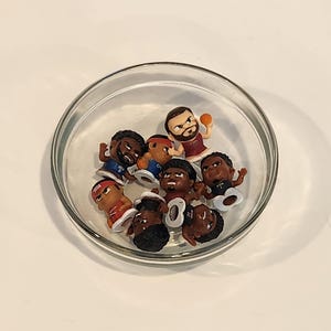 Sports toppers and beads for beaded pens