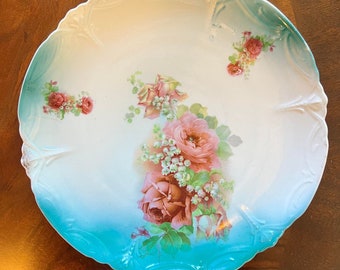 Assiette vintage en porcelaine rose et bleu sarcelle