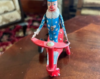 Vintage Tin Litho Wind Up Toy Clown on Red Scooter
