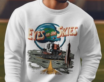 Eyes on the Skies Vintage Space Graphic Tee, Retro Astronaut T-Shirt, Outer Space Inspired Shirt, Sci-Fi Themed Space Art Tee