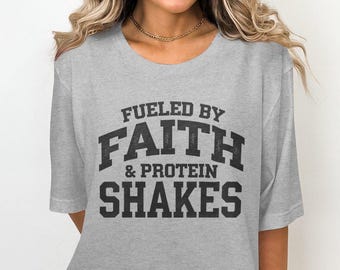 Fueled by Faith and Protein Shakes T-Shirt, Motivational Graphic Tee, Workout Shirt, Gym Wear, Fitness Apparel, Inspirational Quote Top