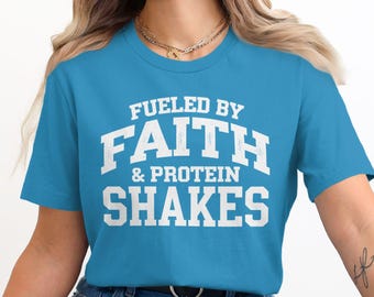 Christian Fitness Shirt, Fueled By Faith and Protein Shakes Graphic Tee, Inspirational Fitness Shirt, Workout Motivation T-Shirt