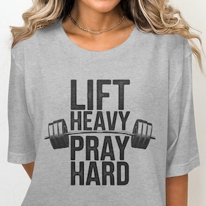 Lift Heavy Pray Hard T-Shirt, Motivational Fitness Tee, Workout Gym Shirt, Gym Apparel, Fitness Enthusiast Gift, Exercise Motivation