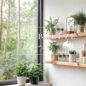 May include: A bright interior scene featuring wooden shelves adorned with potted plants, candles, and decorative items. The shelves are mounted on a white wall, with a large window offering a view of lush greenery. The text "BLU BREEZE" is visible.