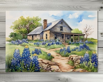 May include: Watercolor painting of a rustic wooden house with a porch, surrounded by vibrant bluebonnets and green grass. A dirt path leads to the house under a blue sky. The text "Artemis Illumination Designs" is at the bottom.