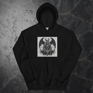 May include: Black hooded sweatshirt with a graphic print of a demon with wings and a pentagram. The demon is drawn in a black and white style.
