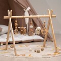 Crocheted Highland Cow Baby Gym: Custom Wooden Activity Center product logo