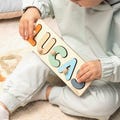 Personalized Name Puzzle with Pegs: Montessori Wooden Toy product logo