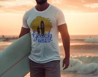 Camiseta con estampado de ambiente playero: camiseta con silueta de surfista al atardecer.