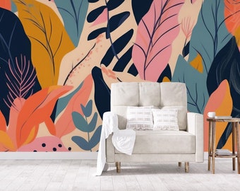 May include: A colorful abstract floral pattern wallpaper with a white armchair and a small wooden side table in front of it.