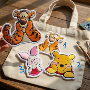 May include: A set of three ceramic mugs with a speckled, matte finish in cream, light grey, and dark grey. Each mug has a minimalist design, ideal for tea or coffee.