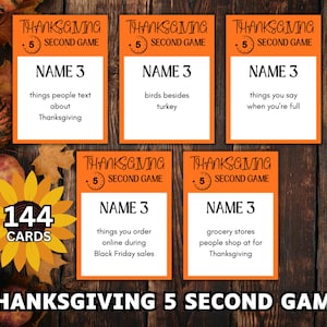 May include: Thanksgiving 5 Second Game with 144 cards. The game cards are orange with white text. The cards have prompts like "things people text about Thanksgiving" and "birds besides turkey".