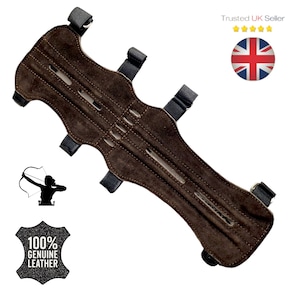 May include: Brown leather archery arm guard with adjustable straps and multiple slots. The arm guard is made of 100% genuine leather.