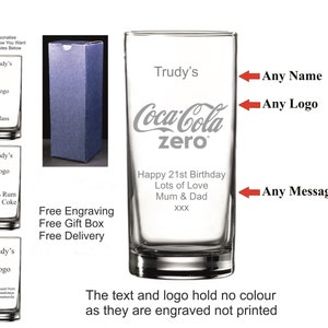May include: A clear glass tumbler with an engraved design featuring the Coca-Cola zero logo, a name, a logo, and a message. The text reads "Trudy's", "Coca-Cola zero", "Happy 21st Birthday", "Lots of Love", "Mum & Dad", and "XXX".