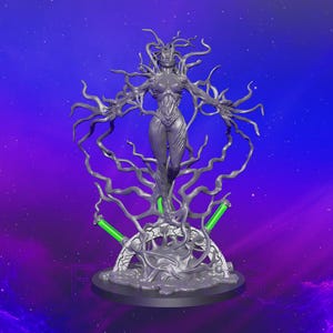 May include: A gray, detailed, 3D printed figurine of a female figure with vines growing from her body. The figure is standing on a circular base with a textured surface. The figure is posed with arms outstretched and has a flowing, organic design.