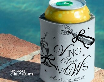 May include: A white can cooler with black illustrations of a champagne bottle and glass, with the text "Vino before Vows" and "Amelia's Bachelorette". The text "No More Chilly Hands" is also visible.
