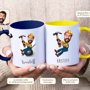 May include: Two white ceramic mugs with blue and yellow accents. One mug features a cartoon illustration of a person swinging from a wrecking ball with a hammer. The mug is personalized with the name "Kristoff". The other mug has the same illustration but with a yellow accent and the name "KRISTOFF".