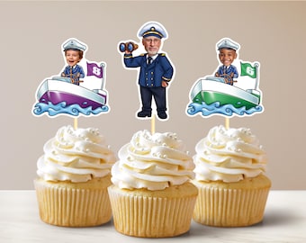 May include: Three cupcakes decorated with white frosting and topped with a captain themed cupcake topper. The toppers feature a cartoon captain with a boat and a number on the sail.