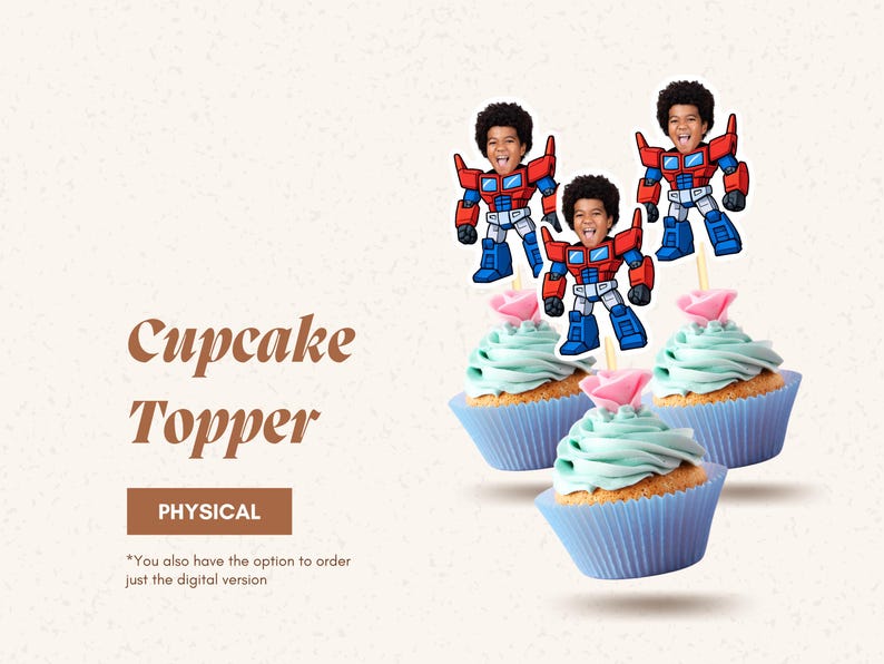 May include: Three cupcakes with blue frosting and pink flower decorations. Each cupcake is topped with a cartoon robot figure with a child's face. The image includes the text "Cupcake Topper" and "PHYSICAL".
