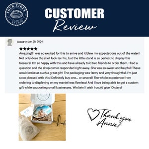 May include: A customer review for a handmade shell with a stand, featuring a photo of the product and a handwritten thank you note. The review praises the quality, packaging, and customer service. The text reads "Amazing!! I was so excited for this to arrive and it blew my expectations out of the water! Not only does the shell look terrific, but the little stand is so perfect to display this treasure! I'm so happy with this and have already told two friends to order them. I had a question and the shop owner responded right away. She was so sweet and helpful! These would make as such a great gift! The packaging was fancy and very thoughtful. I'm just sooo pleased with this! Definitely buy one... or several! The whole experience from ordering to displaying on my mantel was flawless! And I love being able to get a custom gift while supporting small businesses. Win/win! I wish I could give 10 stars! Thank you Annie!"