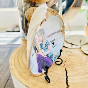 Mothers day gift photo in shell with gold trim and personalized wording.