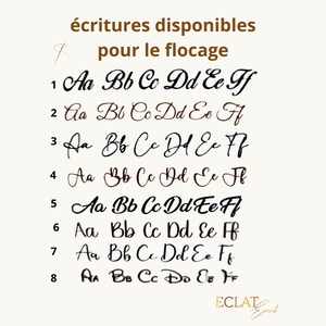 May include: Image showcasing eight different cursive font styles, each labeled with a number and displaying the alphabet from A to F. The text "&eacute;critures disponibles pour le flocage" is at the top, with the logo "ECLAT Event" at the bottom.