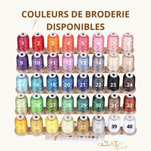 May include: An image displays a variety of embroidery thread spools in a rainbow of colors, each labeled with a number from 1 to 40. The text "COULEURS DE BRODERIE DISPONIBLES" is at the top.