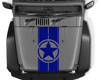 May include: An overhead shot of a grey vehicle bonnet with a blue star and stripe design. The bonnet has a large blue star within a circle, between two blue stripes. The vehicle's front end is visible, including the windscreen and side mirrors.