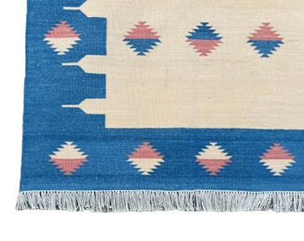 MAGAZIJNOPRUIMING Blauw en beige Trinidad Dhurrie