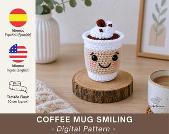 May include: A crocheted coffee mug with a smiling face, whipped cream, and a coffee bean on top. The mug is tan, white, and brown, and sits on a wooden coaster. The finished size is approximately 4 inches.