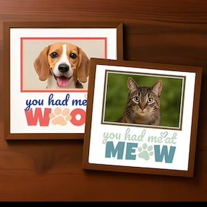 May include: Two framed pet portraits. One features a beagle with the text "you had me WOOF." The other shows a tabby cat with the text "you had me MEOW." Both frames are brown with white borders.