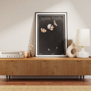 May include: A framed poster with a black background and white text that reads "Jujutsu Kaisen". The poster features two anime characters in black clothing. The character on the right is wearing sunglasses and making a peace sign with their hand.