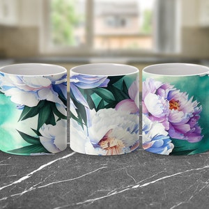 May include: Three white ceramic mugs with a floral design. The mugs feature a watercolor painting of white, purple, and blue peonies on a teal background.
