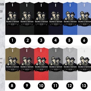 May include: A selection of t-shirts in 13 colors, each featuring a graphic of Sherlock Holmes and Dr. Watson with the text "HOLMES & WATSON 221B". Colors include black, blue, red, and grey.
