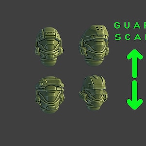 May include: Four green plastic helmets in different sizes, labeled "GUARD SCALE" with arrows indicating size variation.