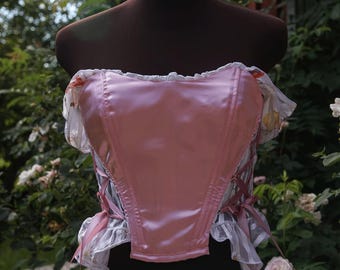 Upcycled pink satin corset with ruffles and drop straps