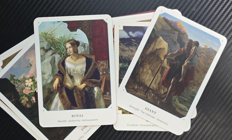 May include: A collection of tarot cards featuring classical art. One card shows a woman in a fur-trimmed coat, labeled "ROYAL." Another depicts a giant carrying a person, labeled "GIANT." The cards have white borders and text at the bottom.