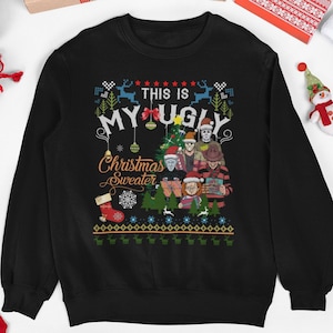May include: Black crew neck sweatshirt with the text "THIS IS MY UGLY Christmas Sweater". The design features a Christmas tree, a stocking, and several horror movie characters. Christmas-themed decorations surround the sweatshirt.