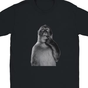 May include: Black t-shirt featuring a black and white image of a monkey in a thinking pose. The monkey is touching its chin with its index finger. The t-shirt is made of a soft, comfortable material.