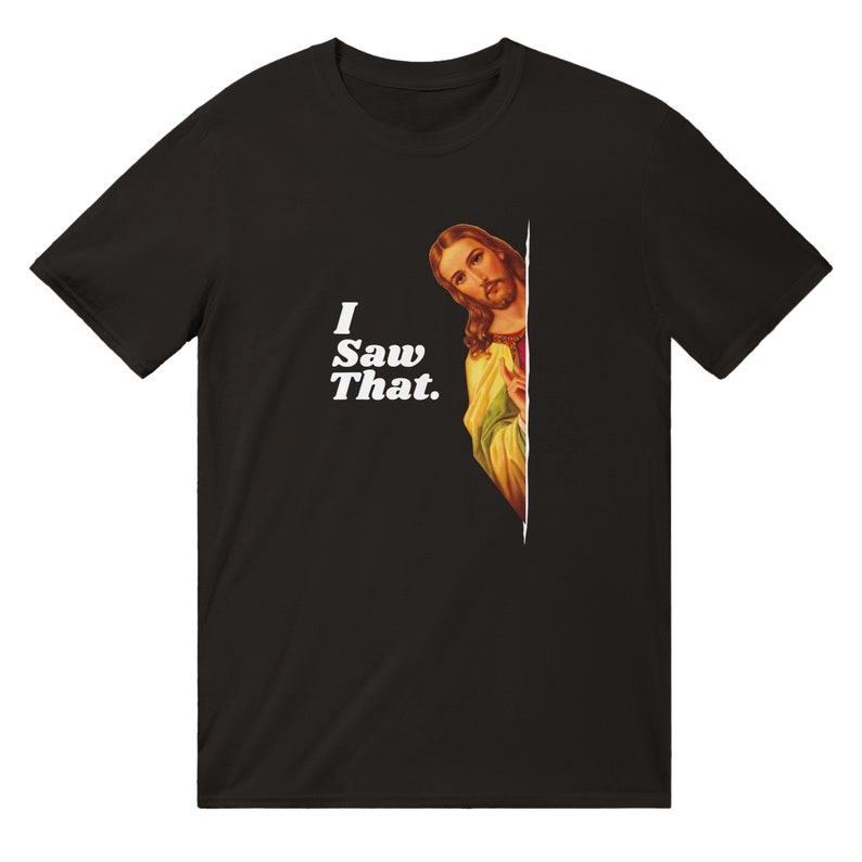 May include: Black t-shirt with a white graphic of Jesus peeking around a corner and the text "I Saw That."