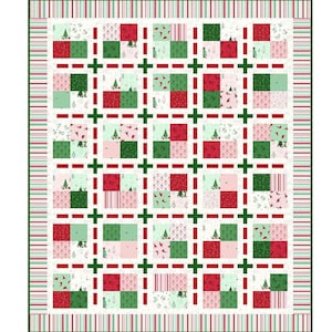 May include: A Christmas-themed quilt with a patchwork design. The quilt features squares of red, green, and pink fabric with tree and stripe patterns. Green plus signs and red dashed lines create a grid pattern. The border has red and green stripes.