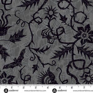 May include: A gray fabric featuring a black ink-style pattern of thorny vines, flowers, spiders, and bats layered over a subtle spiderweb background. A white ruler at the bottom shows the fabric width measures approximately 7.5 inches.