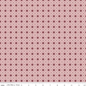 May include: A pink and burgundy fabric with a repeating diamond pattern. The fabric is a quilting cotton and is perfect for crafting projects.