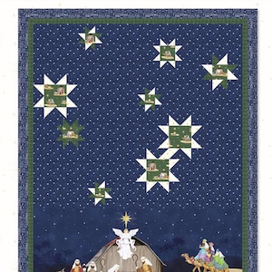 May include: A quilt pattern titled "Stars Over Bethlehem" by Tara Reed. The finished size is 48" x 62". The design features a dark blue background with white stars and a nativity scene at the bottom. The quilt has a green and blue border.