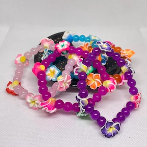 Plumeria flower themed bracelets, Hibiscus flower bracelets, Beaded bracelets, Friendship bracelets